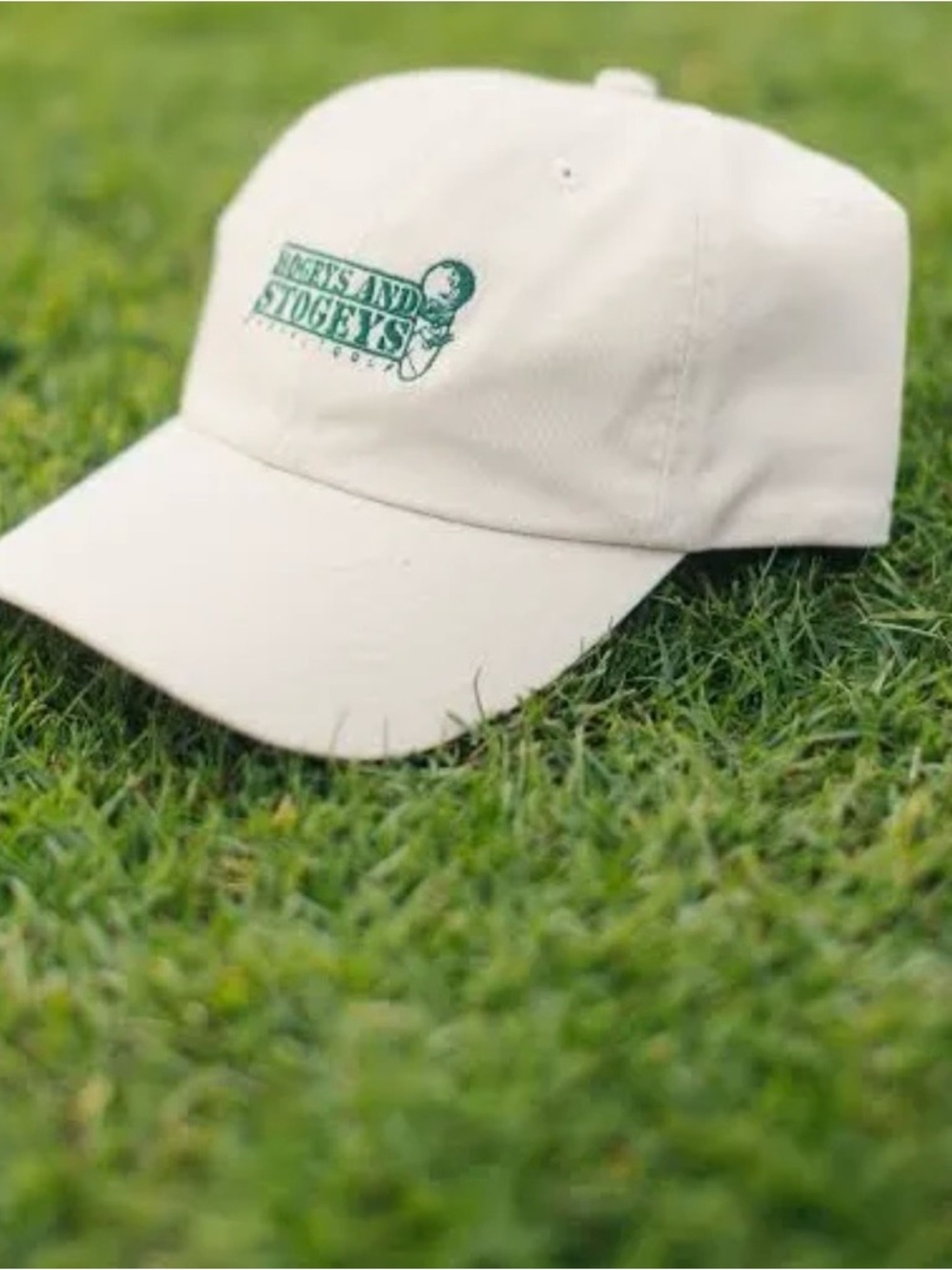Tan Baseball Cap with Green Logo